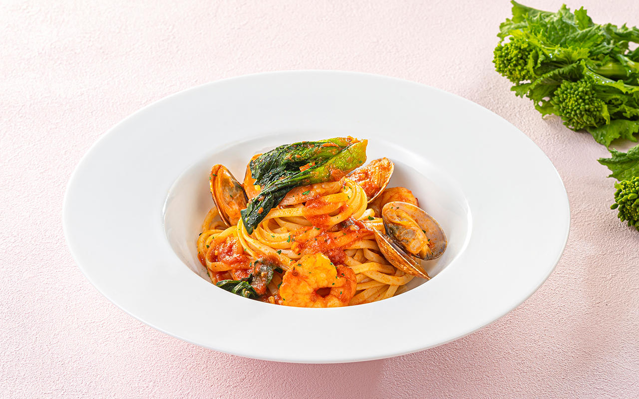 Fresh Pasta with Clams and Rapini in Tomato Sauce